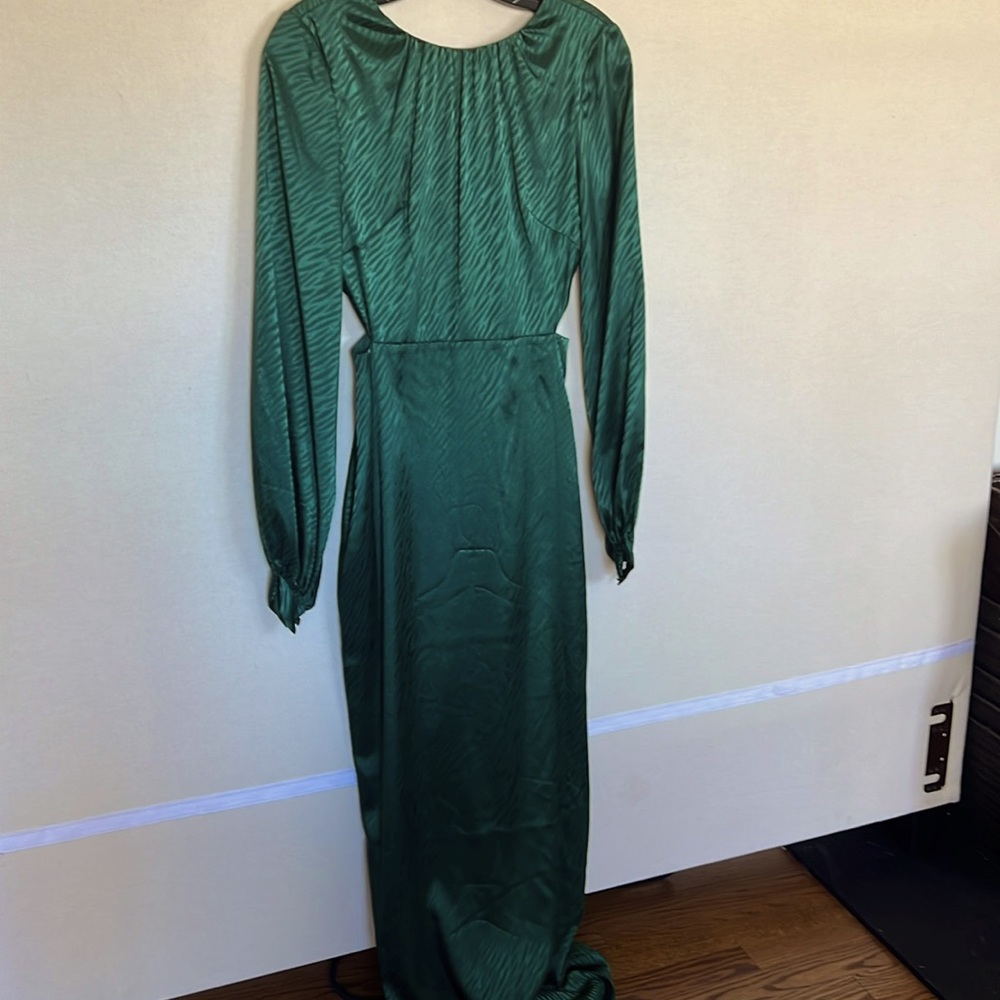 Full length long sleeve green dress with side cut outs. Back has beautiful v